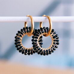 Edelstaal oorbel met ronde facet hanger - zwart/goud