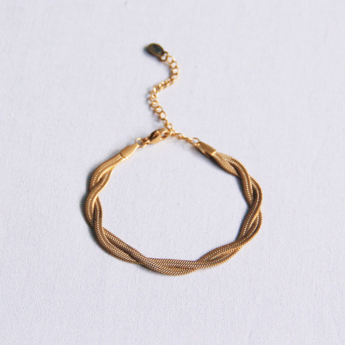 SA860 - Roestvrijstalen gevlochten slangenarmband - goud