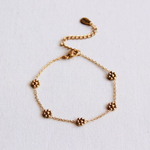 Roestvrij stalen armband met fijne madeliefjesbloem - goud