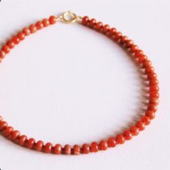 Kralen ketting van natuursteendonuts - oranje/rood