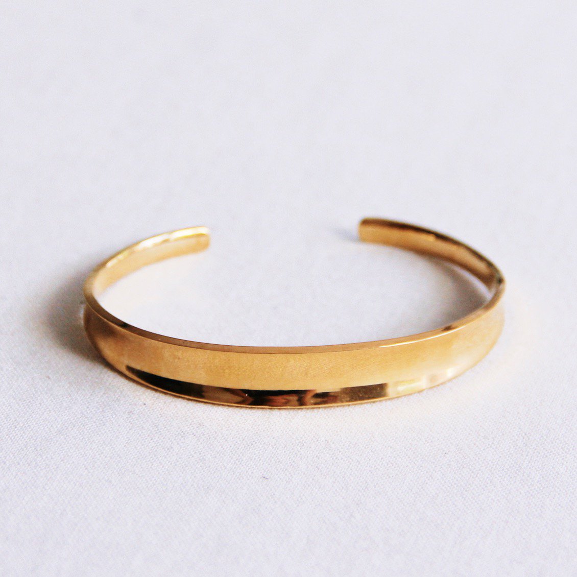 Bangle breed uitlopend - goud