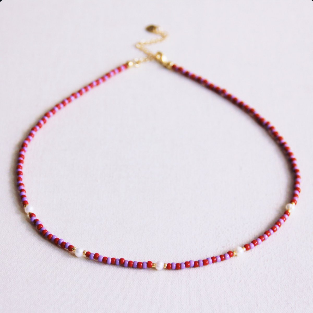Kralen ketting met parels - rood/paars