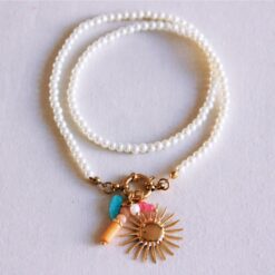 Parelsketting met zon en cluster van edelstenen