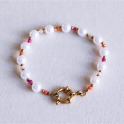 Parelarmband met gekleurde facetten en ronde sluiting - lila/fuchsia/oranje