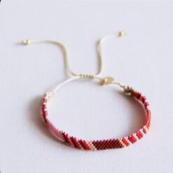 Gestreepte geweven armband - lila/rood/bordeaux