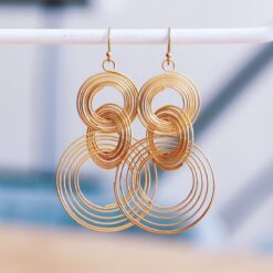 RVS statement oorbel gedraaide ringen - goud