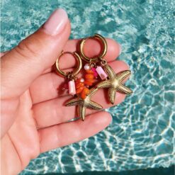 Alternative view of Oorrel met cluster van edelstenen en zeesterren