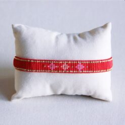 Weven armband met bloempatroon - rood/roze