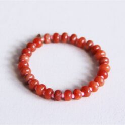 Elastische armband met edelstenen - oranje/roze