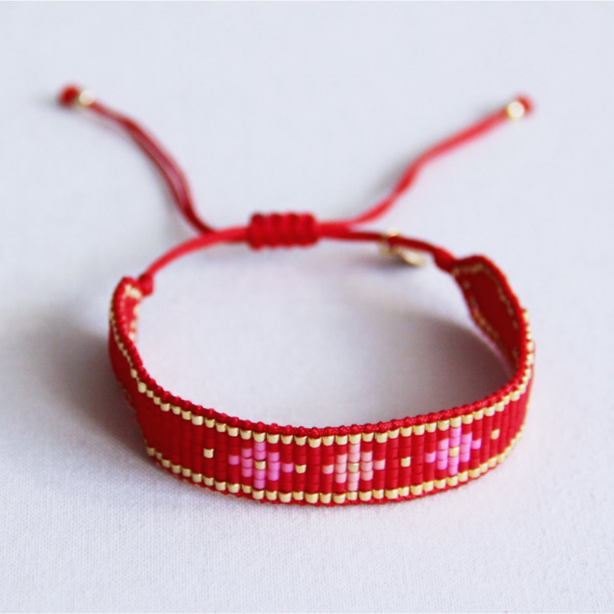 Weven armband met bloempatroon - rood/roze - Afbeelding 2