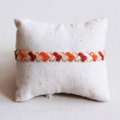Gevlochten Tila kralenarmband - Zalm/Oranje/Bordeaux