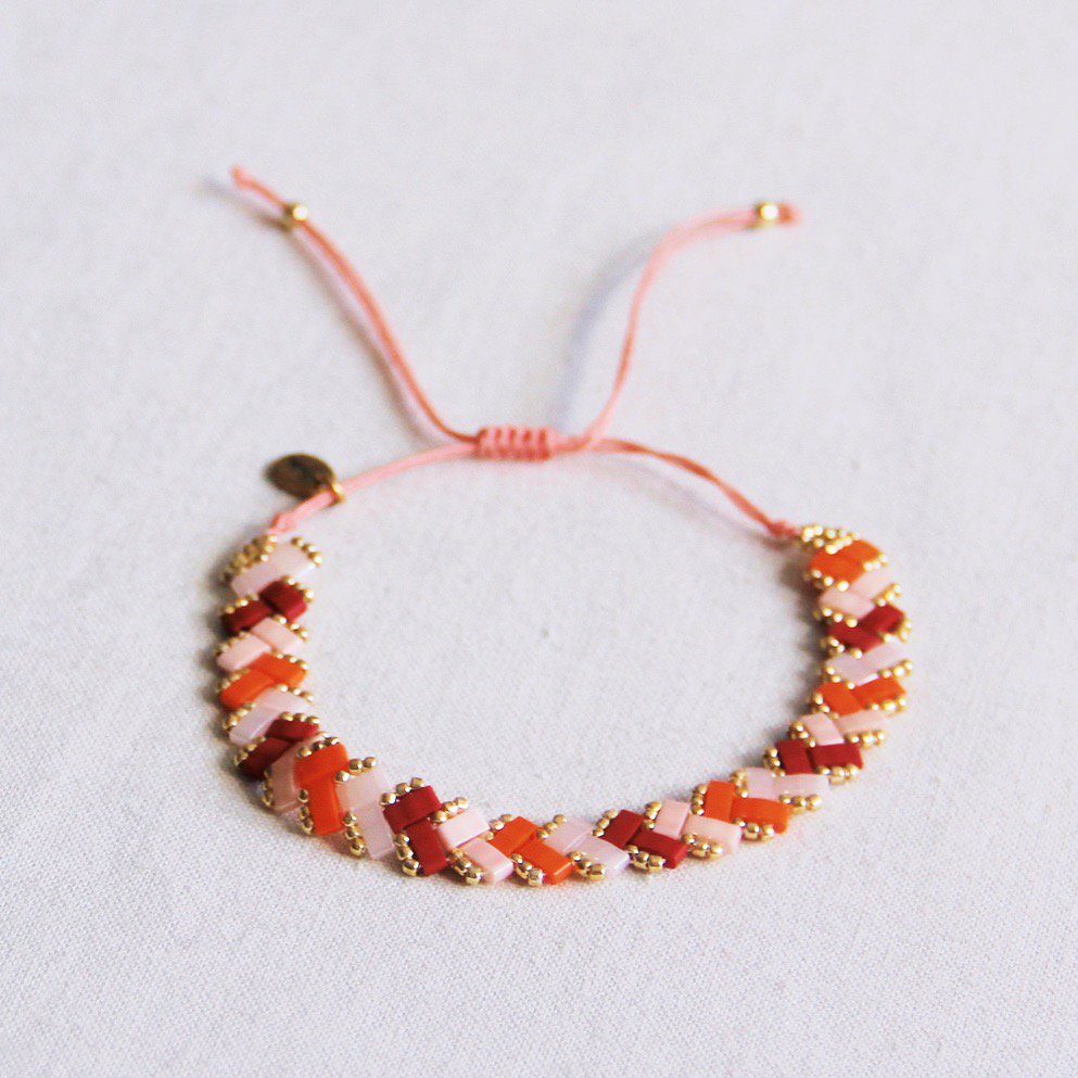 Gevlochten Tila kralenarmband - Zalm/Oranje/Bordeaux - Afbeelding 2