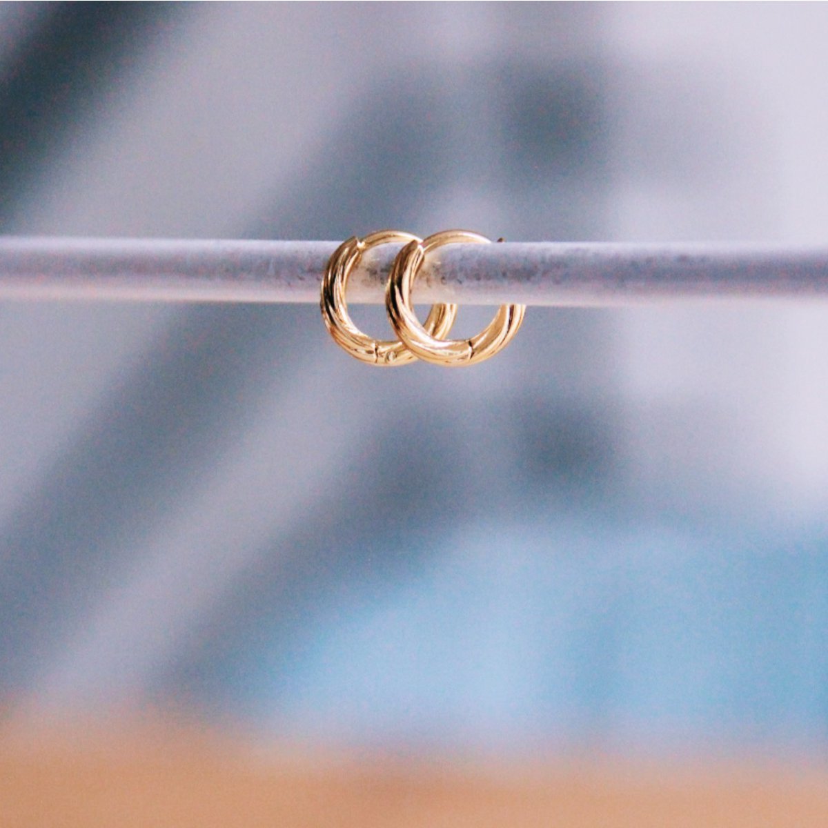 RVS ring 10mm "TWISTED" - goud