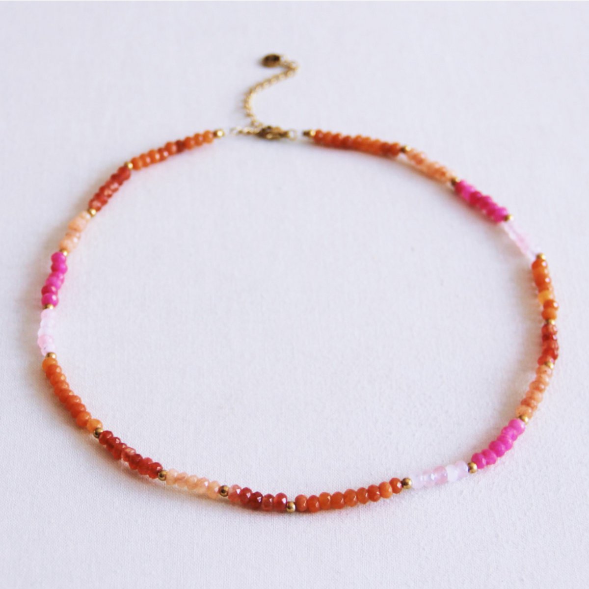 Gefacetteerde ketting - koraal/roze/oranje