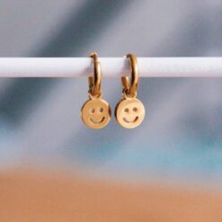 RVS oorringen met smiley β goud